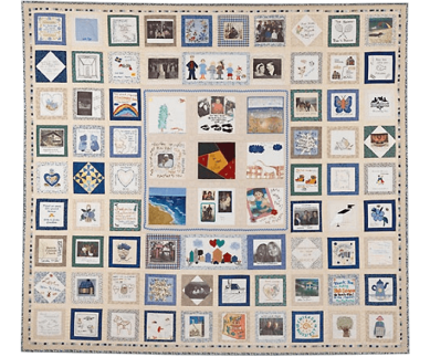 A memorial quilt featuring 90 handmade squares each created by individual family members.